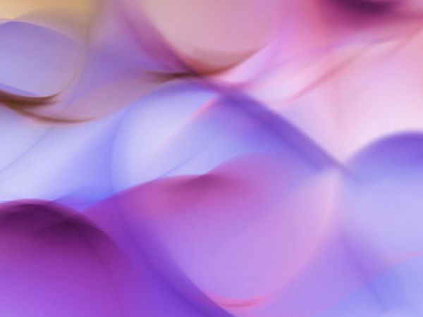 A flowing abstract shape representing harmony and energy